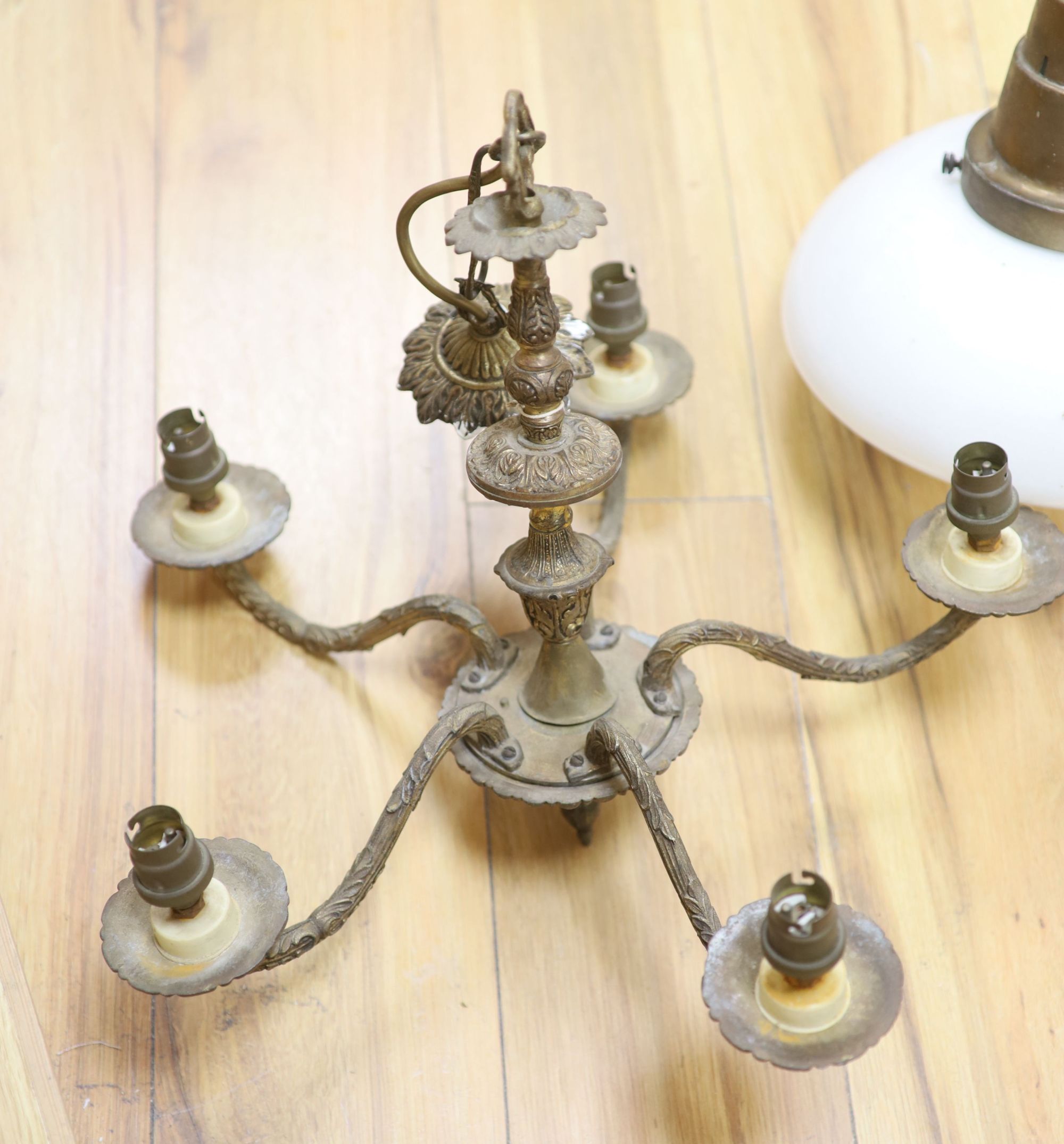 An Art Deco brass and opaline pendant light and a gilt five branch Victorian style chandelier (2)